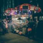 Street Food Vendors - group of people standing near food cart