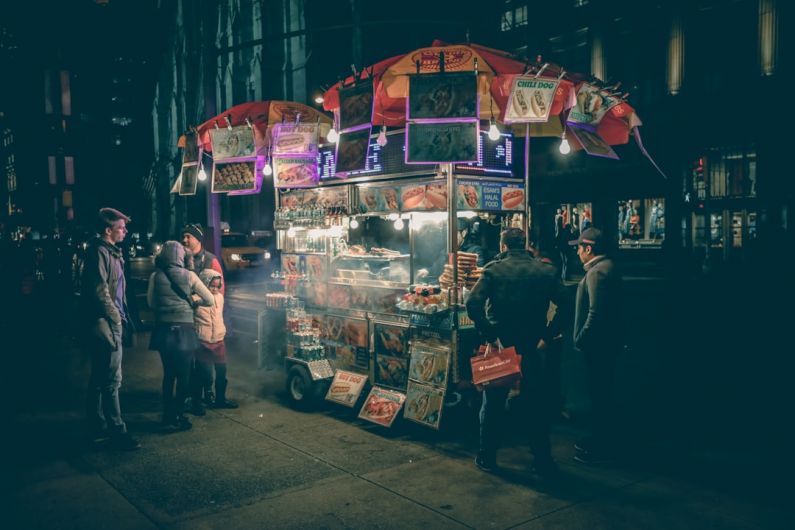 Street Food Vendors - group of people standing near food cart