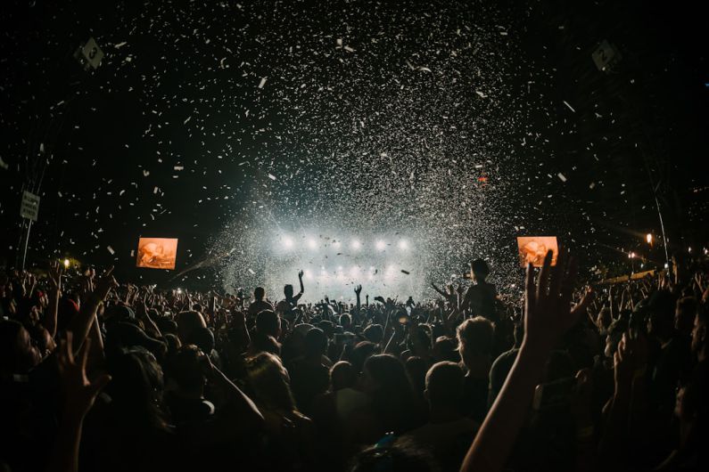 Festivals - people gathering on concert field