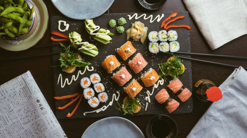 Sushi - sushi on black ceramic plate